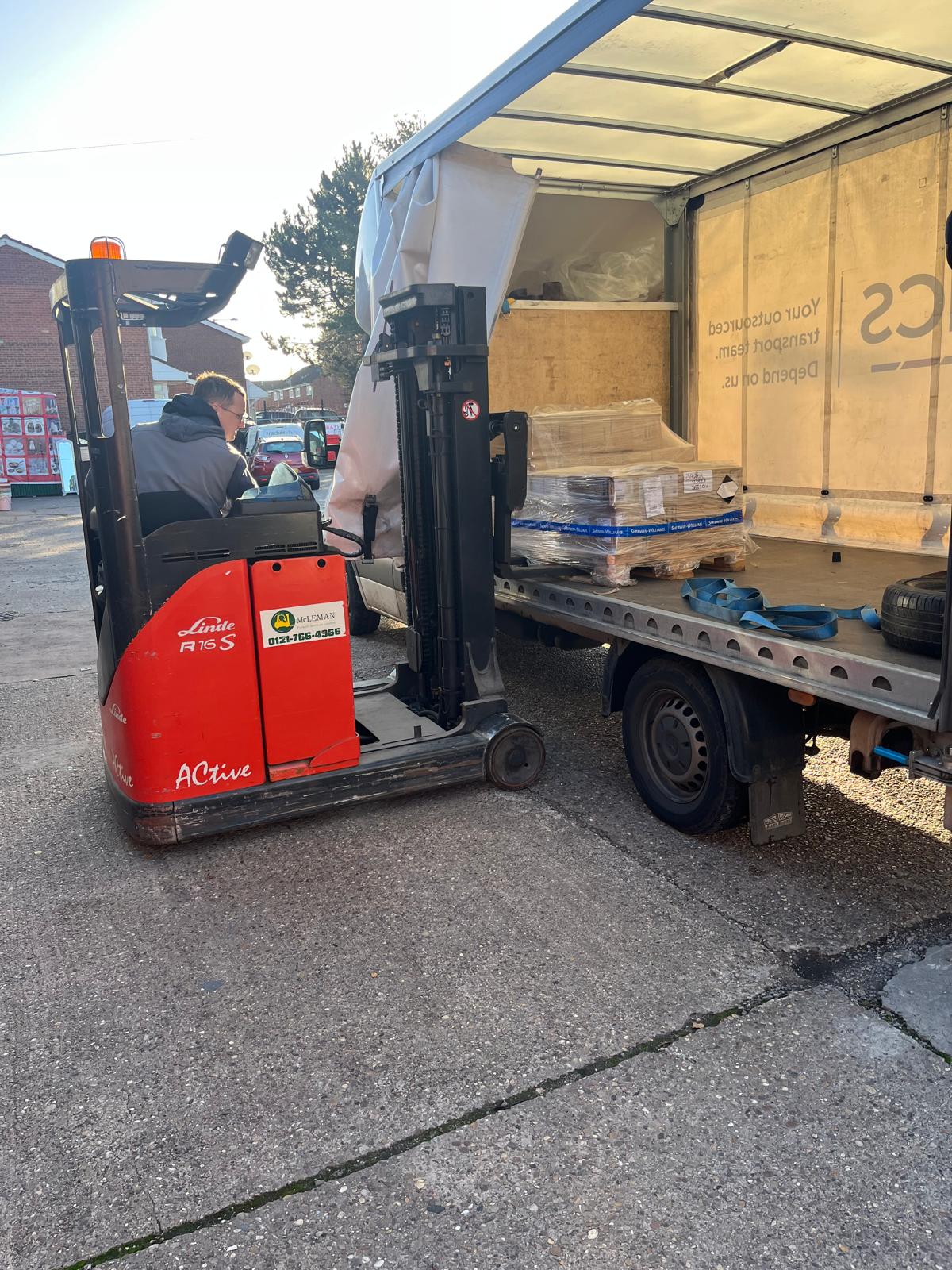 Forklift Truck Taking Delivery Forklift Truck Taking Delivery